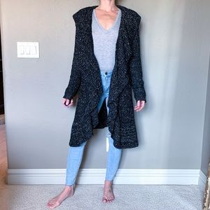 Sioni Long white speckled black cardigan.